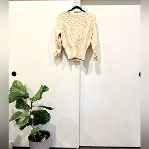 Eva Mendes Polka Dot sweater
Size Large